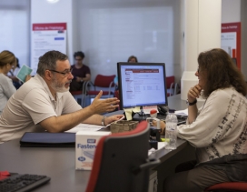 A city resident making an enquiry at a housing office